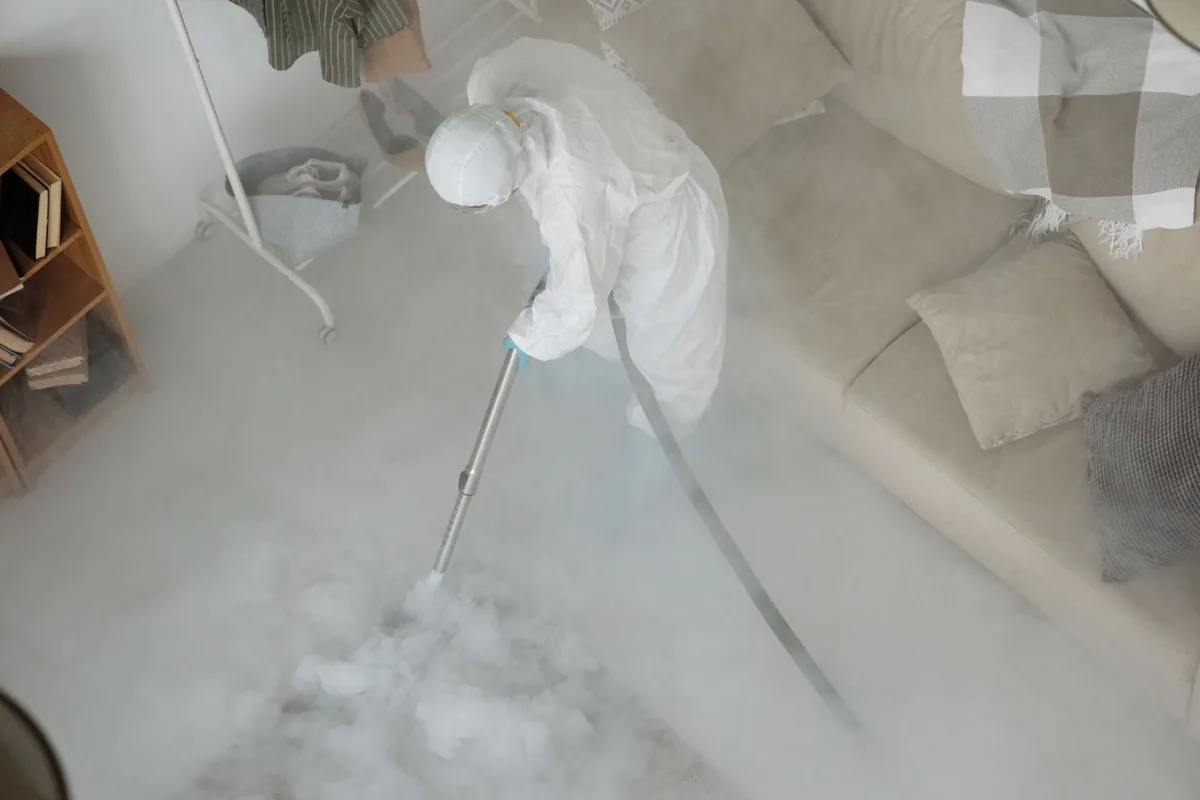 Biohazard cleanup technician in protective equipment, University Place, WA